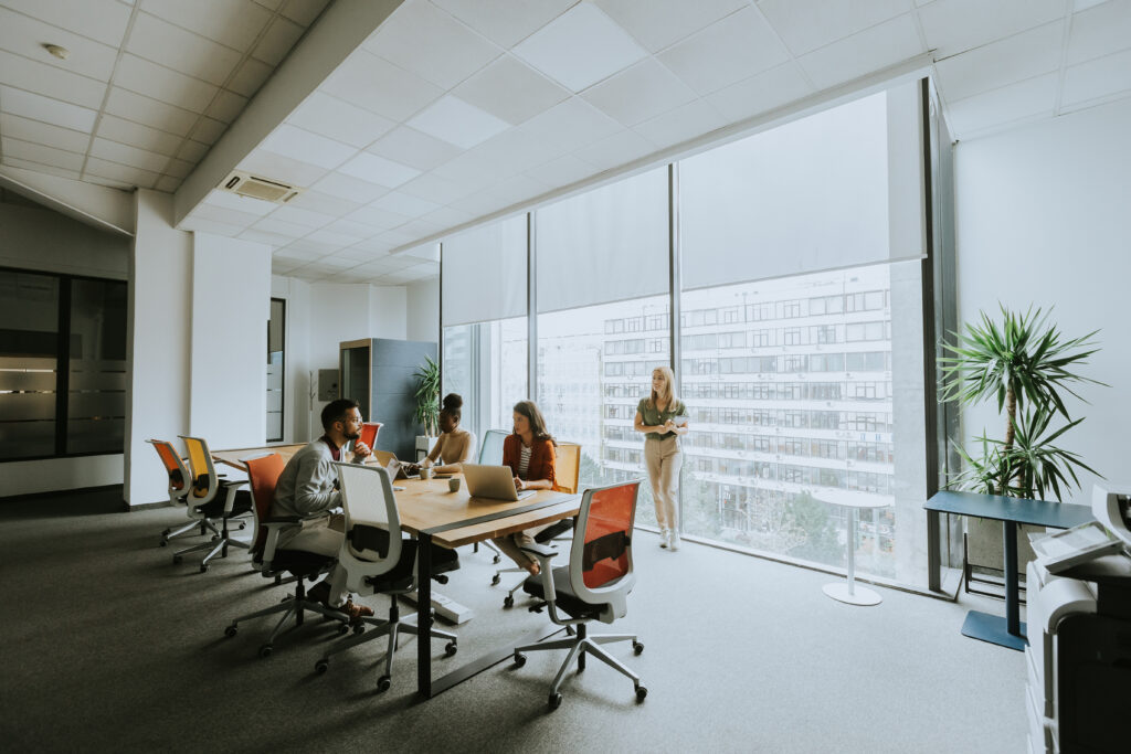 Young multiethnic startup team working at the modern office - Bright A Blind